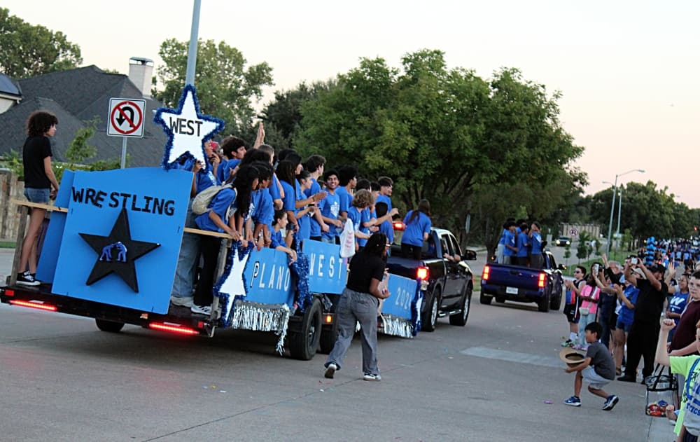 Students on a trailer in a parade.
