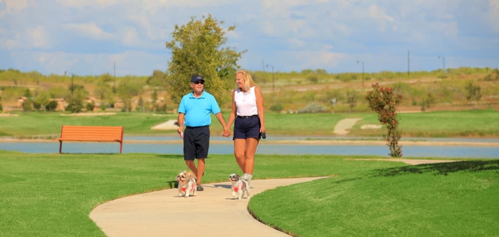 Sunfield residents enjoy leisurely strolls and fresh air on community's extensive walking paths. 