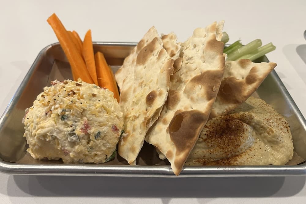 Pimento cheese, hummus, carrots, celery and crackers