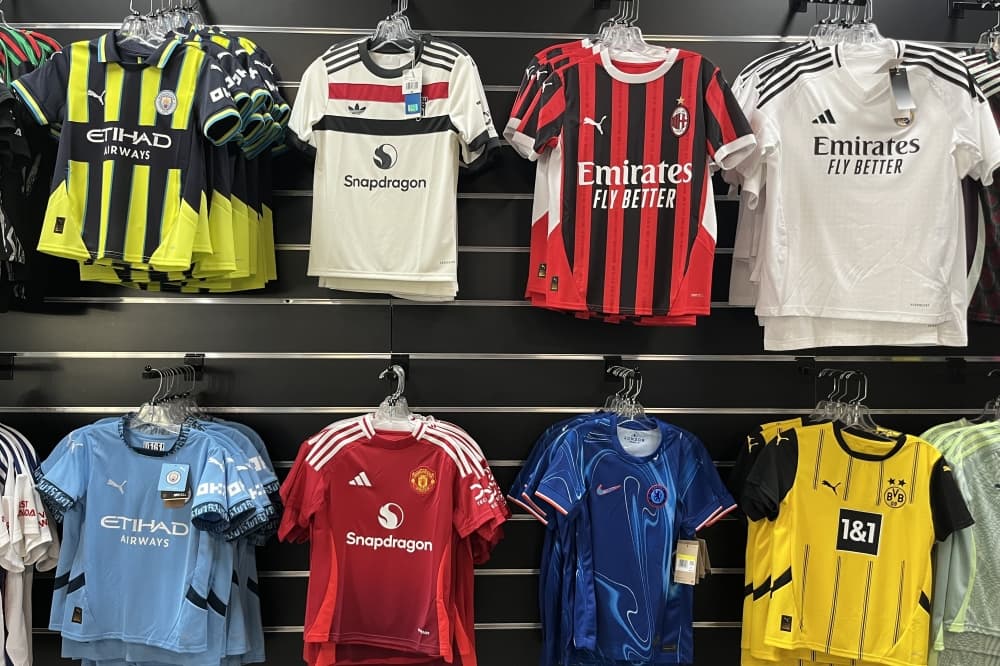 Soccer jerseys on a wall