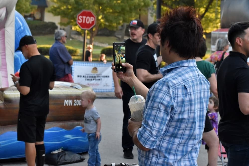 a man taking a photo 