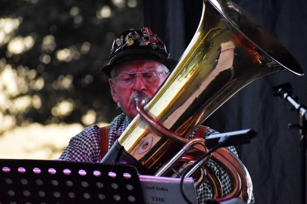 a man playing a tuba