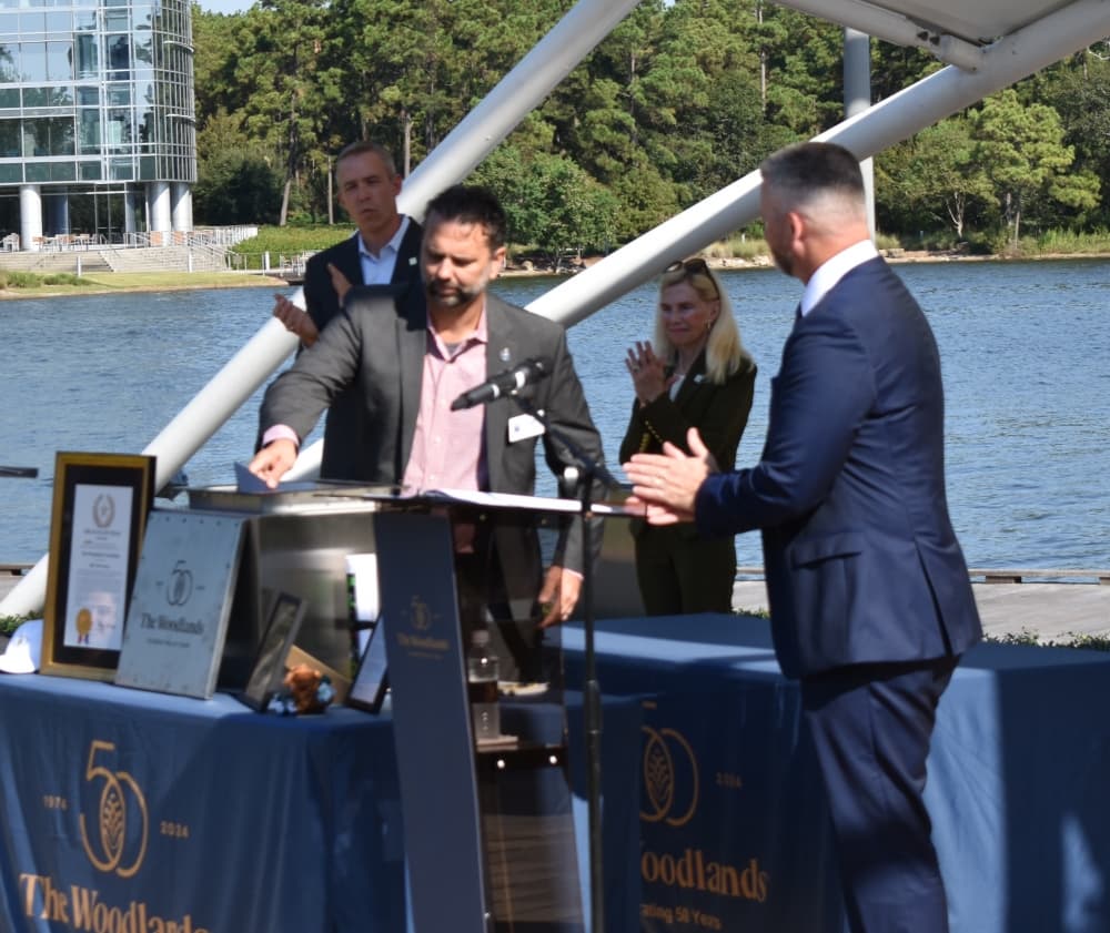 People gather at a podium