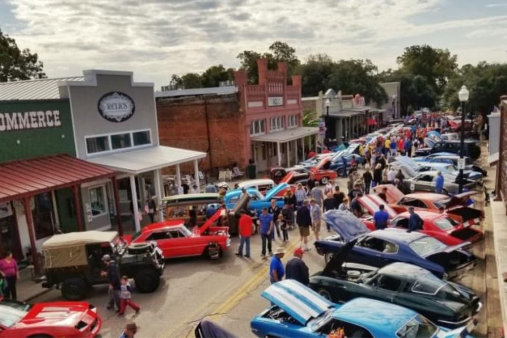 An image of the car show portion of the event at a previous year. 