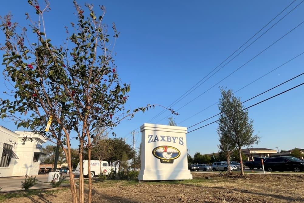Trees replanted at Zaxby's restaurant property in Keller