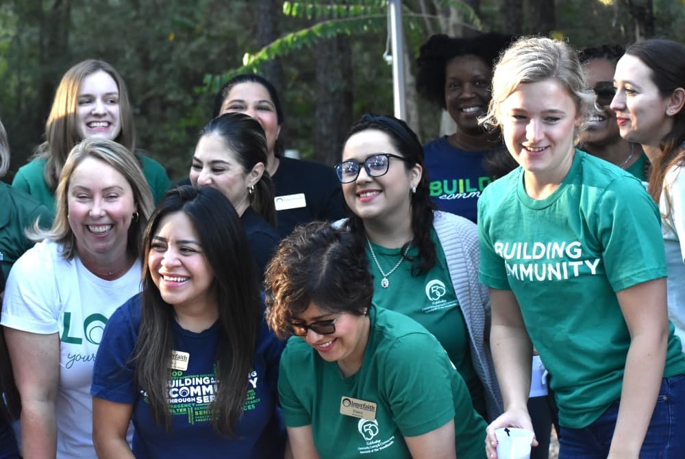 Volunteers take a group photo