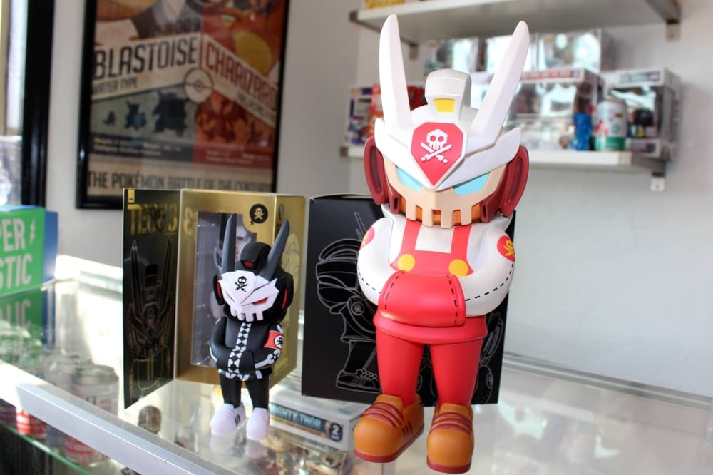 Acton figures on a display case. 