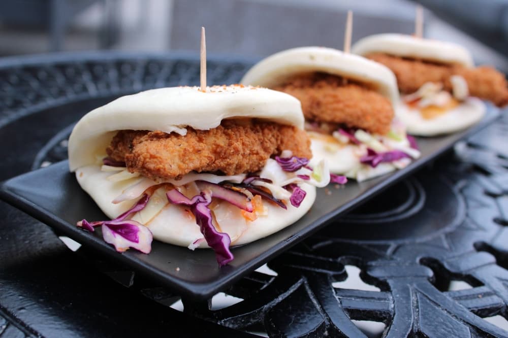 Three fried chicken bao buns.