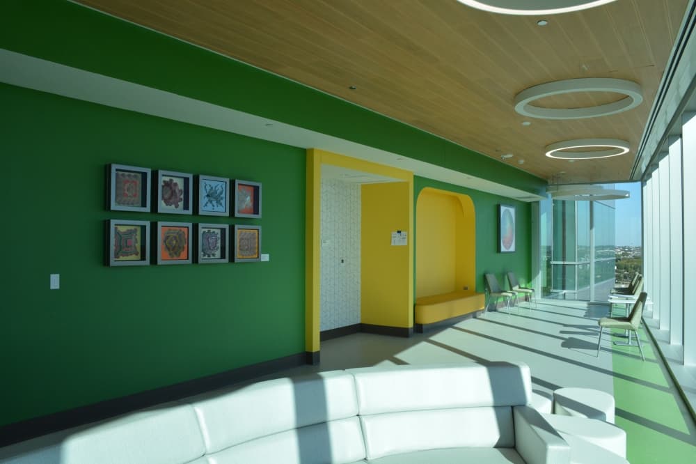 The seventh floor of the new hospital tower includes a lounge area that connects to a nearby balcony. 