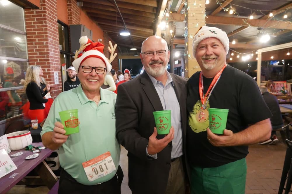 An image of three people who attended last year's event. 