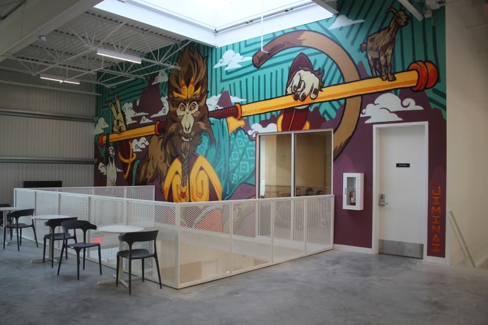 An image of a mural in the center. 