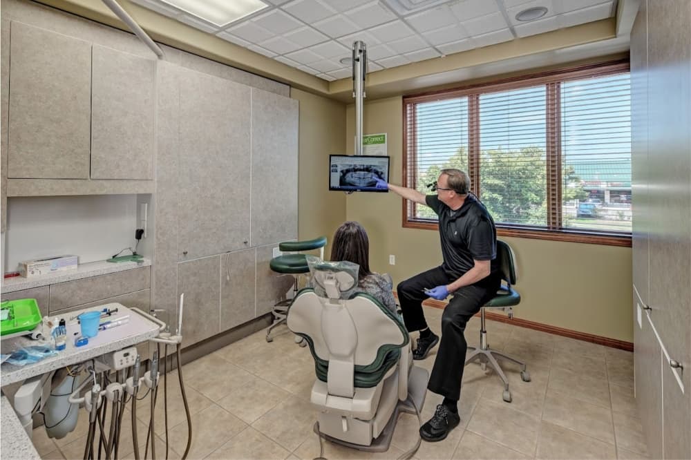An image of Dr. Gallop working with a patient. 