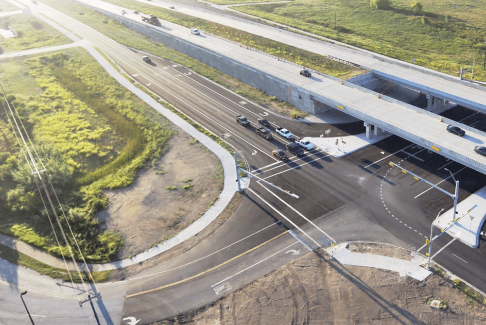 A rendering is shown with one of the overpasses.