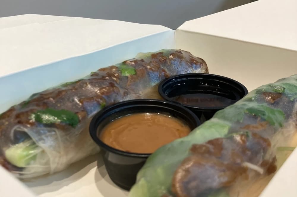 The menu includes spring rolls ($7.75) served with two sauces. (Courtesy Pho Lane)