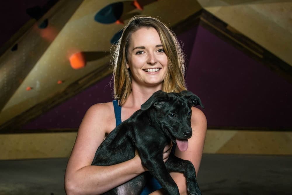 An image of the co-owner of the climbing center. 