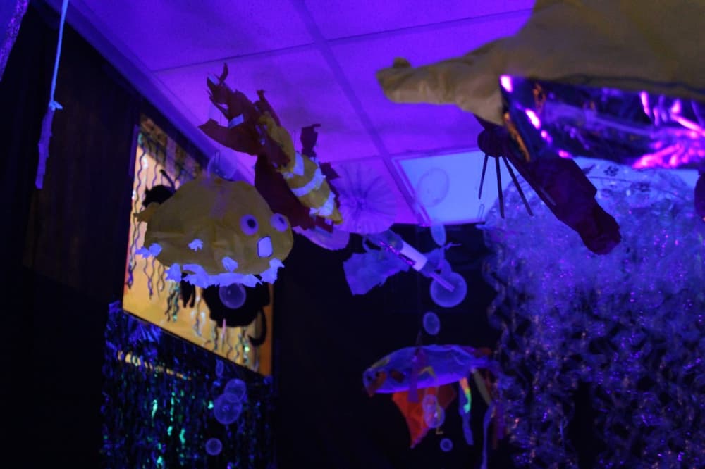 Constructed fish hang from the ceiling in a walk-in underwater exhibit at Cannon Elementary School. 