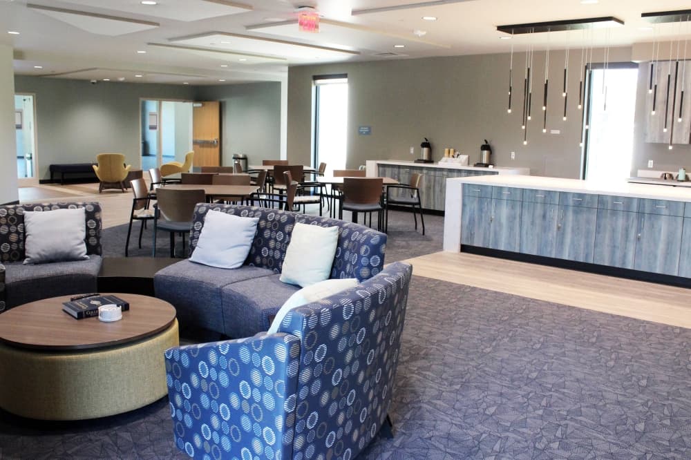 Interior of an open space with blue and gray color scheme. 