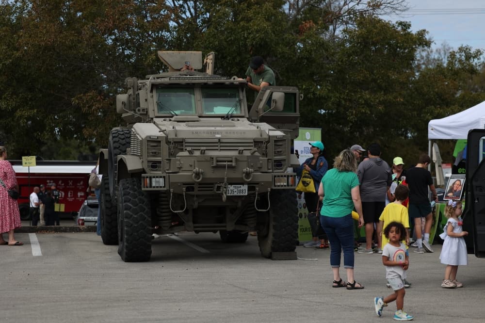 Families viewed an armored vehicle at the Lake Travis Public Safety Day event. (Courtesy Lake Travis Fire Rescue)