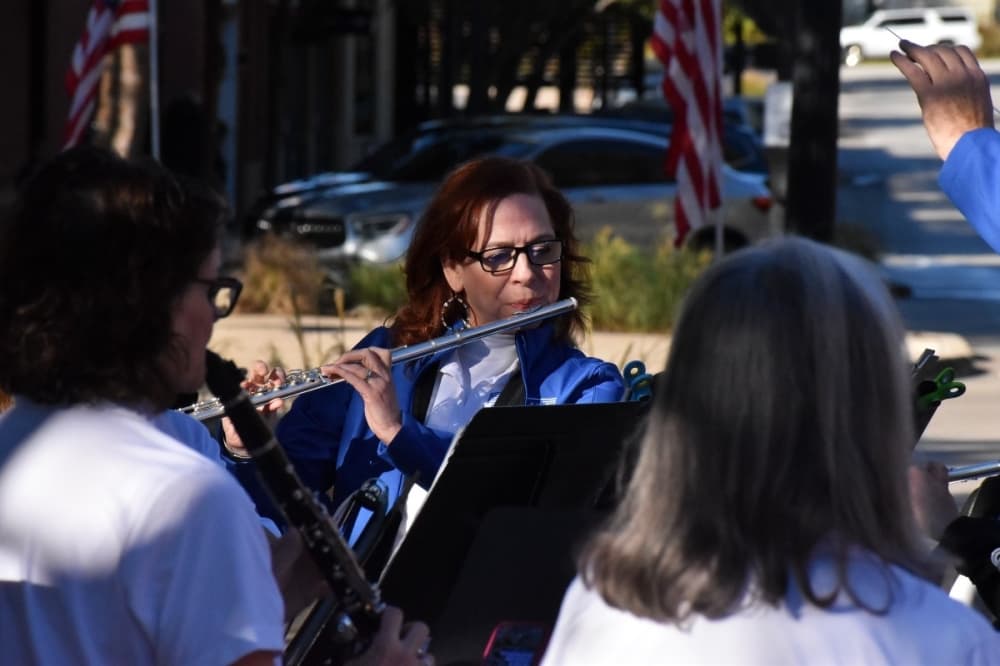 person playing a flute