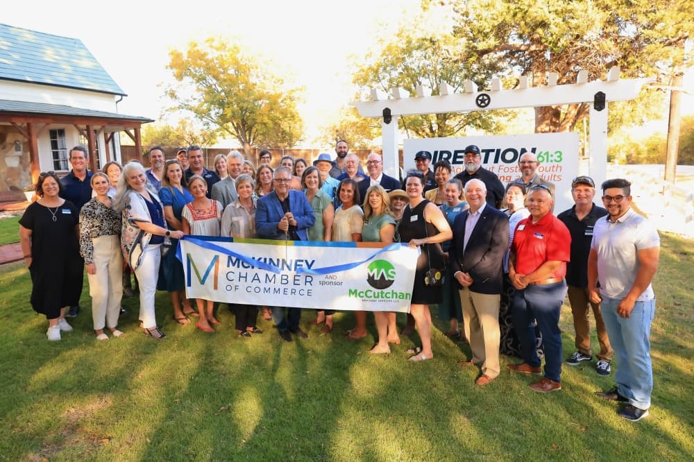 Group of people at the ribbon cutting