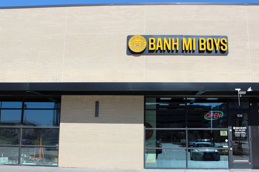 Exterior of building with Banh Mi Boys signage. 