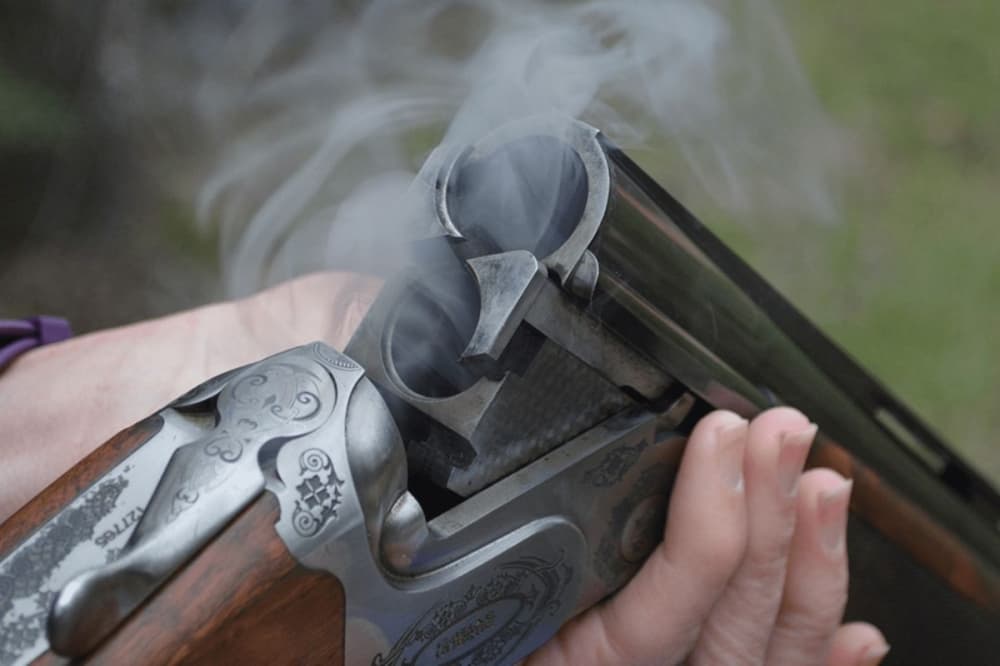 A smoking rifle barrel