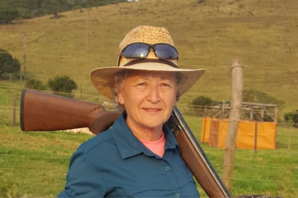 A woman with a rifle