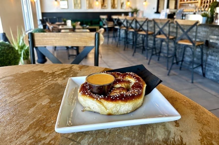The soft pretzel ($9) comes with bier cheese. (Thalia Guzman/Community Impact)