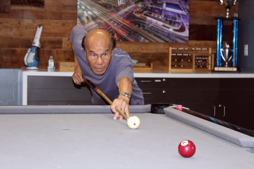 Male playing pool 