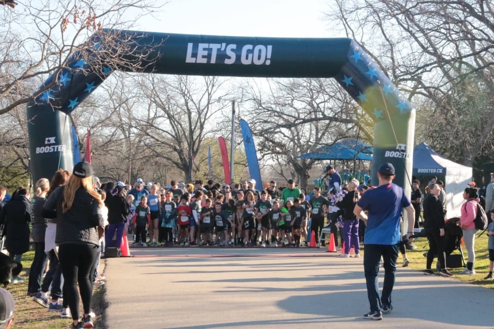 Large group of people at the starting line of a race. 