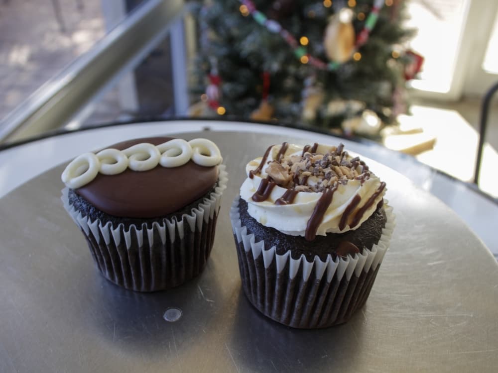 An image of two chocolate cupcakes available. 