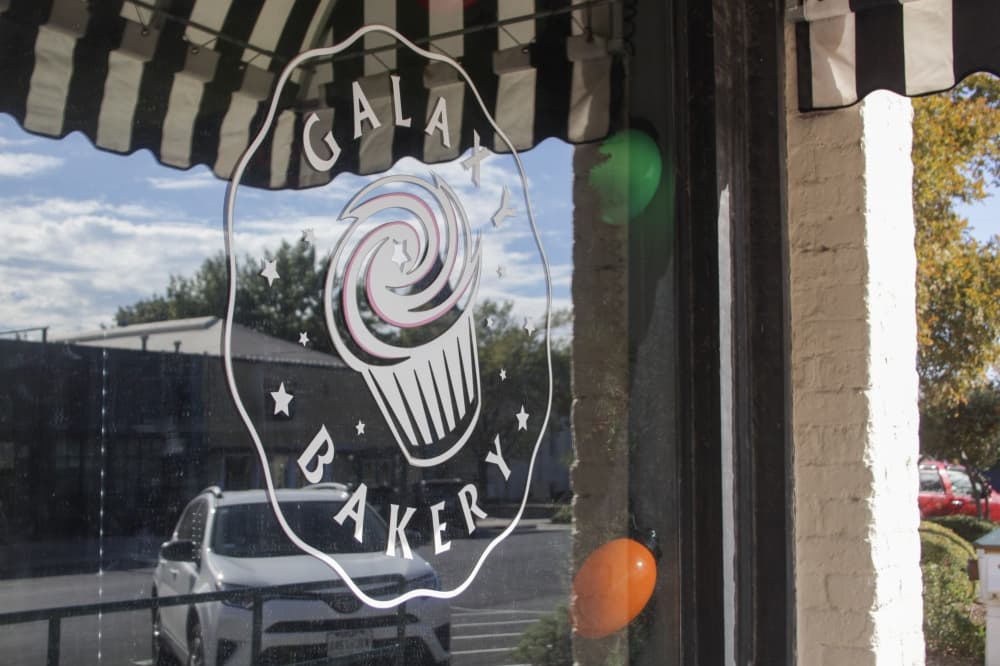 An image of the business sign outside the front window. 