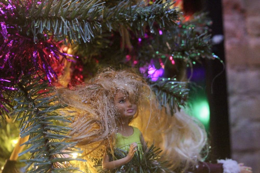 Decked with retro holiday decorations throughout the bar, one of the bar’s Christmas trees uses Barbie dolls as ornaments. (Dacia Garcia/Community Impact)
