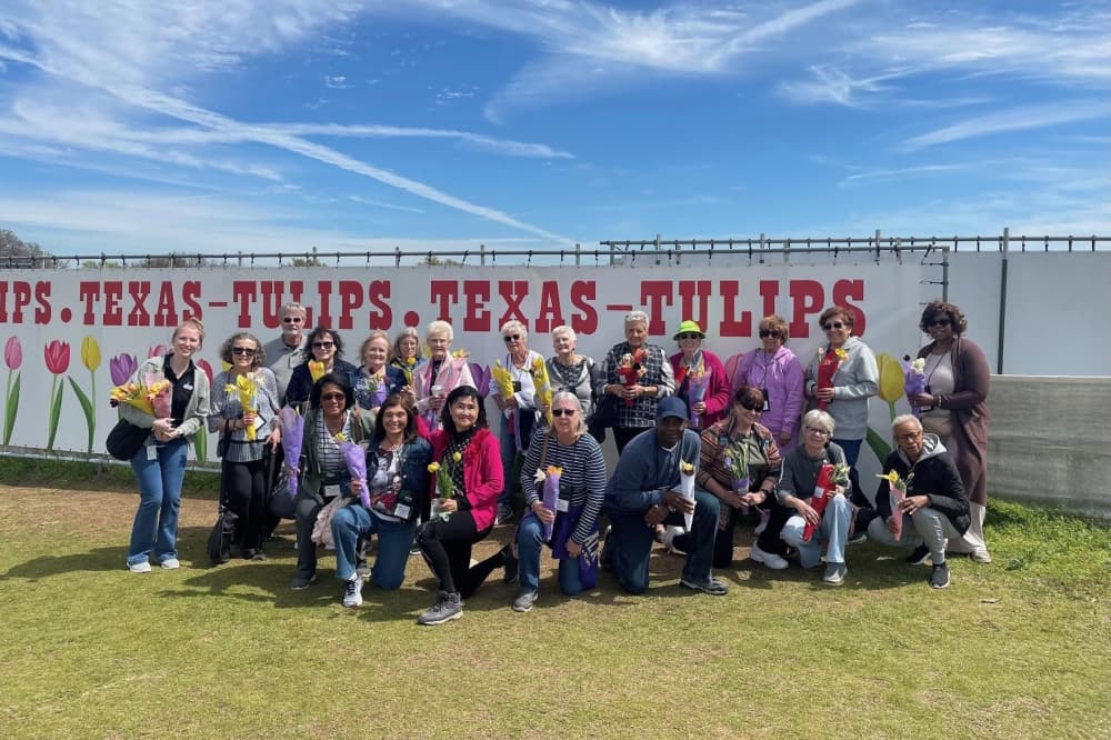 group of people at a tulip farm