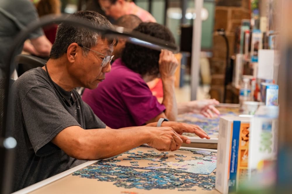 Man doing a puzzle