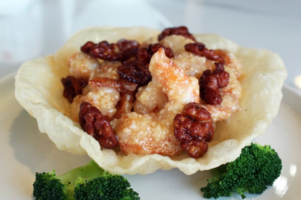 Shrimp with walnut in a edible bowl. 