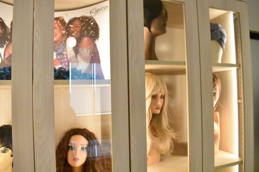 wigs on display