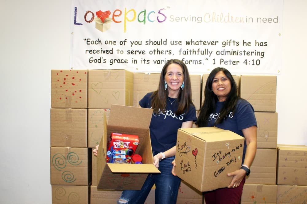 Michelle Leavitt, at left, and Ritu Gupta are the co-leaders of Lovepacs Plano community. (Karen Chaney/Community Impact)