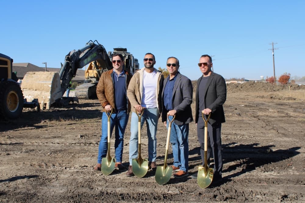 Representatives of SLX Capital at a groundbreaking