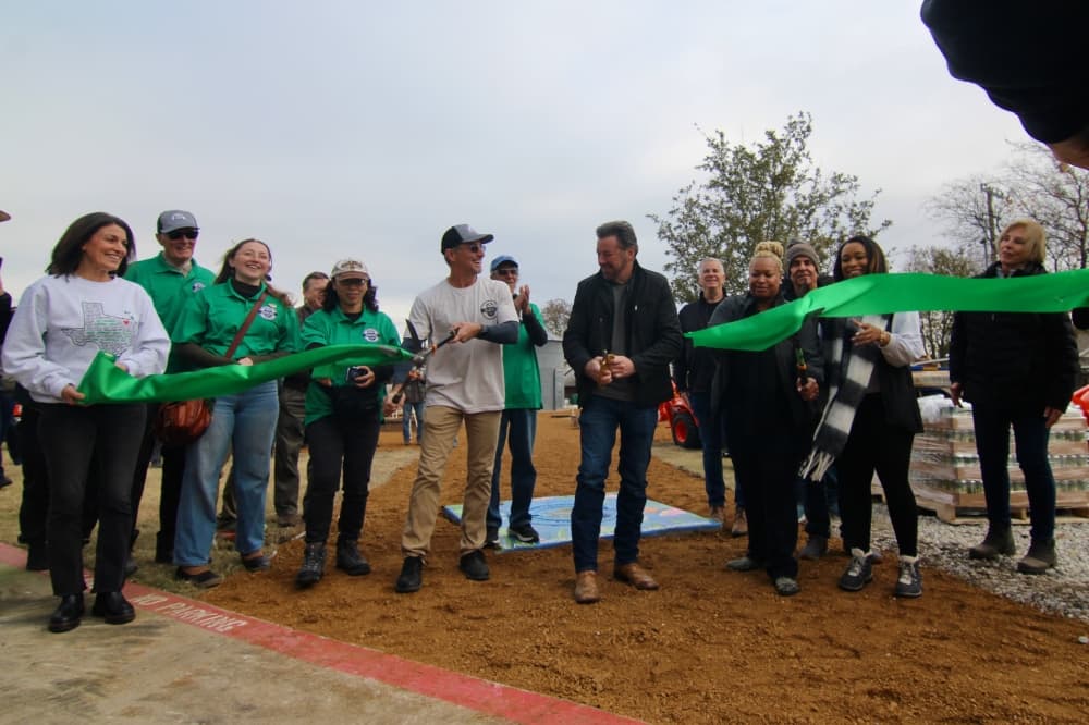 East McKinney Learning Garden representatives celebrate progress with ribbon-cutting