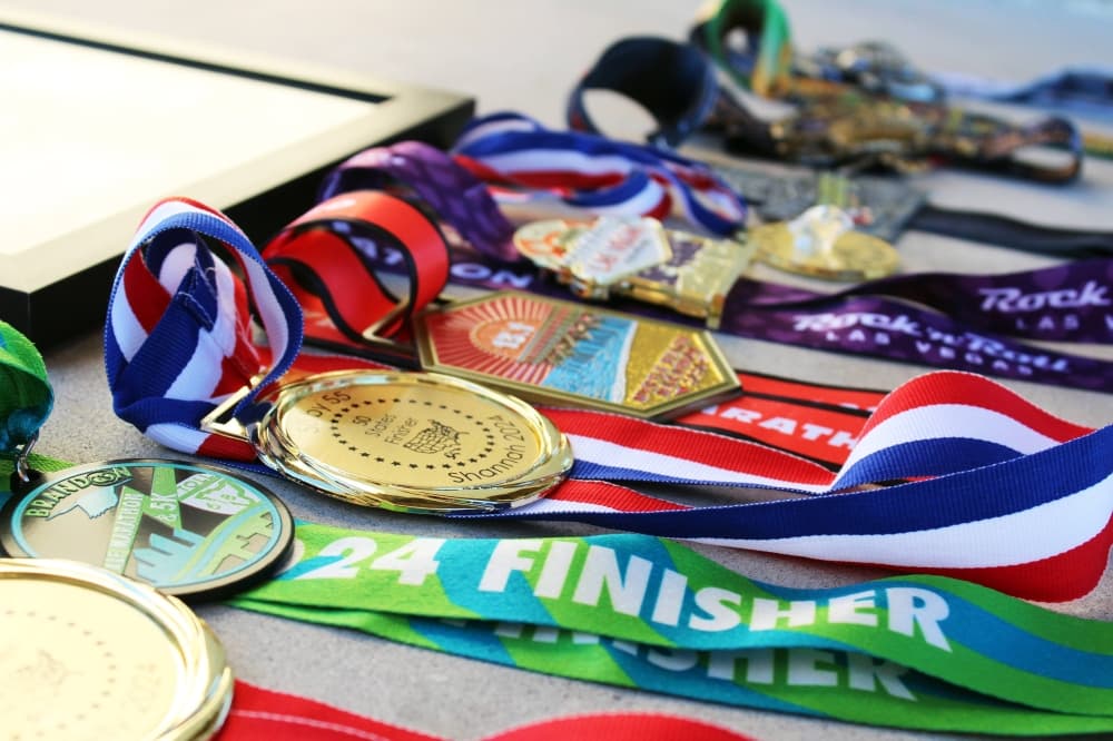 Multiple race finish ribbons displayed side by side. 