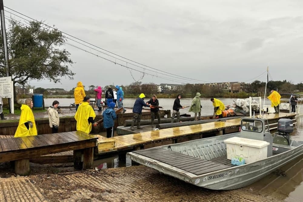 People at a boat landing