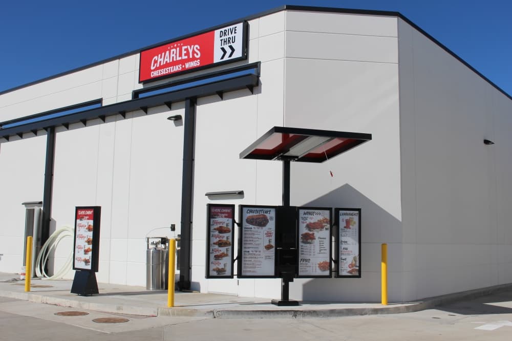 The Charleys Cheesesteaks & Wings drive-thru sits empty after the store celebrated its grand opening on December 27, 2024.