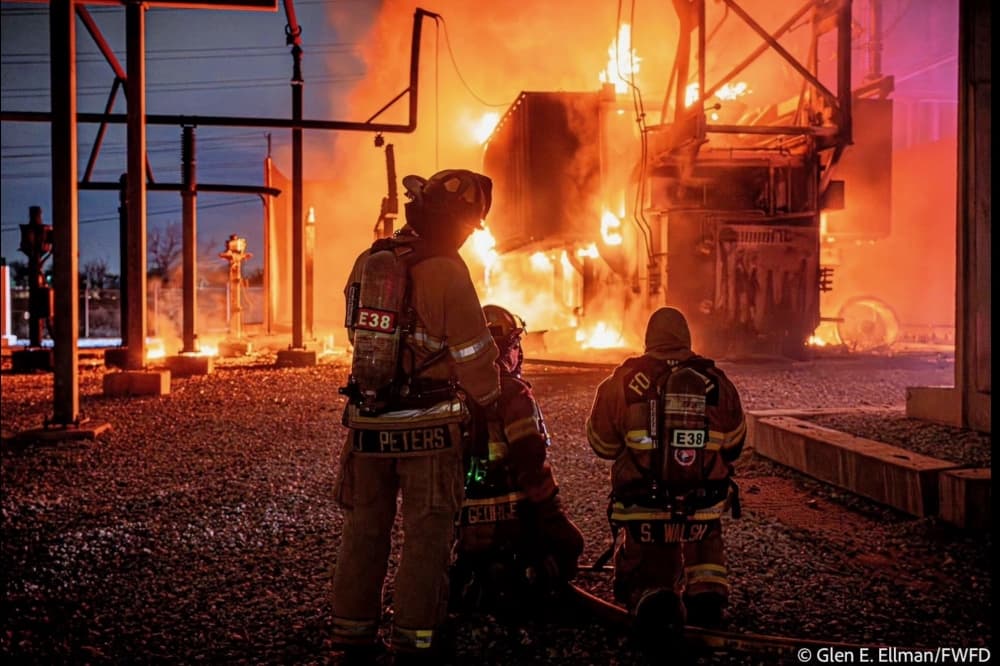 Fire fighters looking at the fire