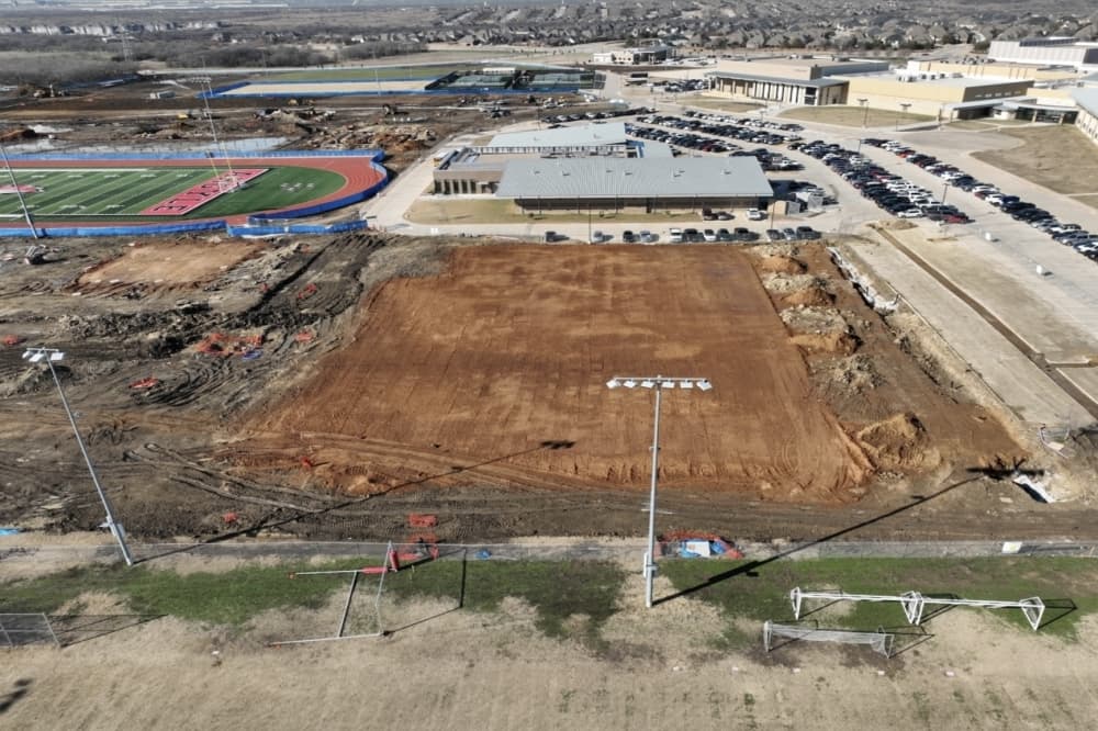 Moisture conditioning has completed on the indoor activity center site and crews will begin drilling to install piers in the coming weeks. (Courtesy AISD)