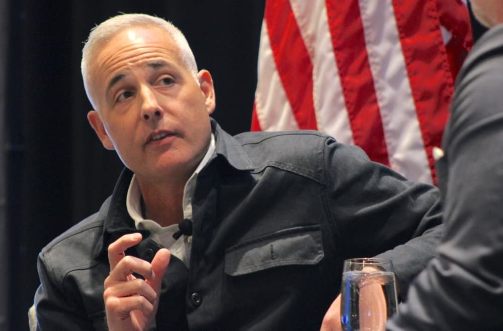 Georgetown mayor responds to a question during a luncheon. 