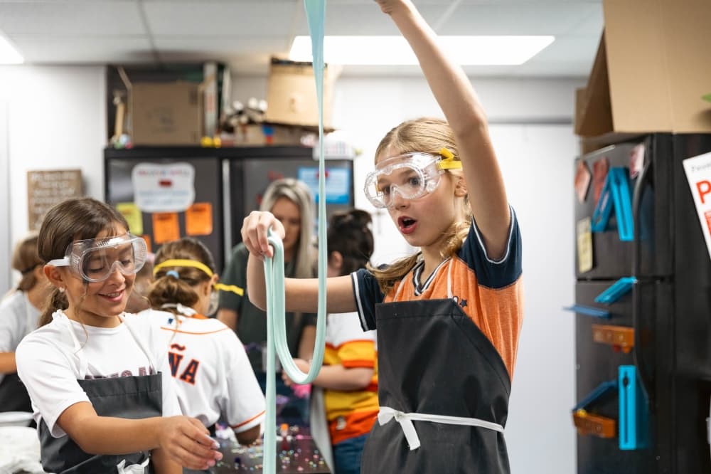 children playing with slime in STEM class 