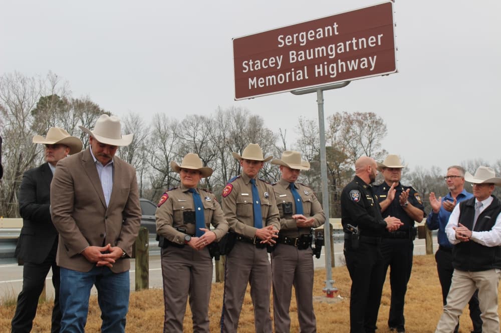 Precinct 4 Commissioner Matt Gray unveiled the sign at the intersection of FM 1485 and Hwy. 242. (Jessica Shorten/Community Impact)