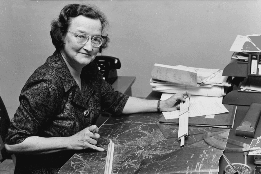 A black and white photo of Moncure is shown while she works.