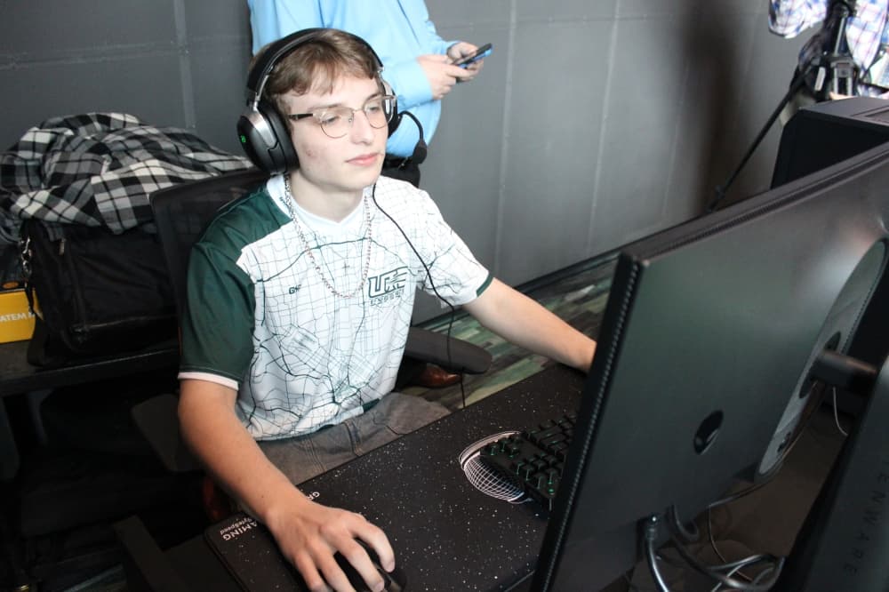 A college student playing video games